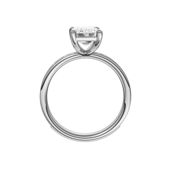 A profile view of the Emerald cut diamond engagement ring in platinum with a diamond channel band and cathedral setting