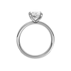 The profile view of the Oval cut diamond engagement ring in platinum with a diamond channel band and cathedral setting