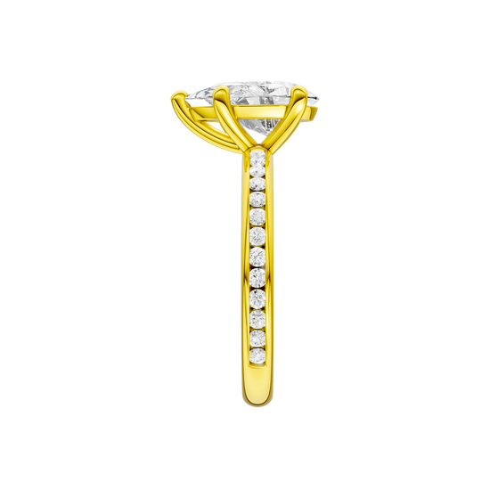 A side view of the Pear cut diamond engagement ring in 14k yellow gold with a channel band and solitaire setting
