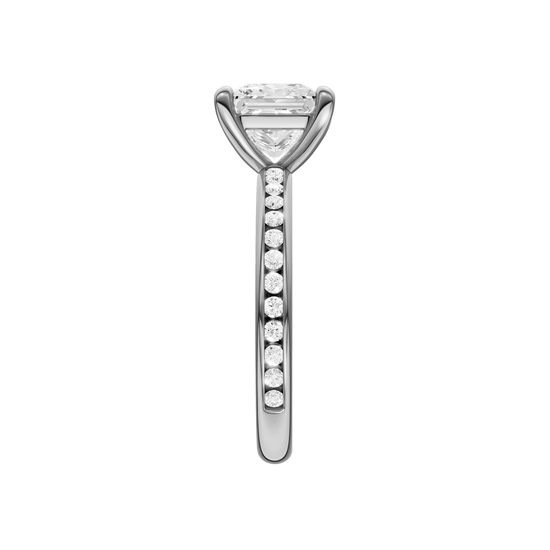 A side view of the Princess cut diamond engagement ring in 14k white gold with a diamond channel band and cathedral setting
