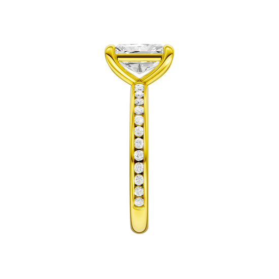 A side view of the Radiant cut diamond engagement ring in 14k yellow gold with a diamond channel band and cathedral setting.