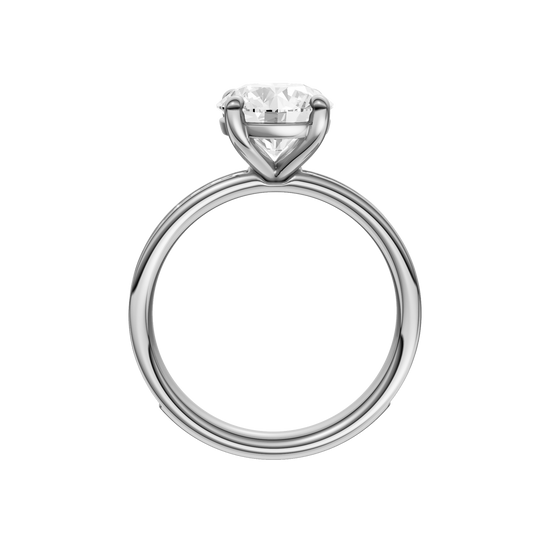 A profile view of the Round cut diamond engagement ring in 14k white gold with a diamond channel band and cathedral setting