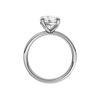 A profile view of the Round cut diamond engagement ring in 14k white gold with a diamond channel band and cathedral setting