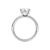 A profile view of the Elongated Cushion cut diamond engagement ring in 14k white gold with a channel band and hidden halo setting