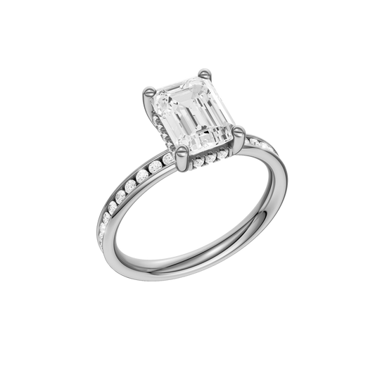 A three-quarter view of the Emerald cut diamond engagement ring in platinum with a diamond channel band and cathedral setting