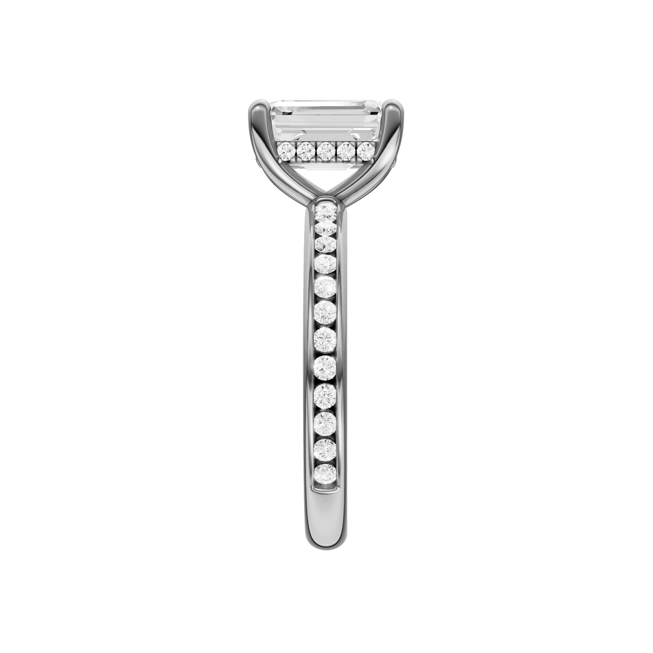 A side view of the Emerald cut diamond engagement ring in 14k white gold with a diamond channel band and cathedral setting
