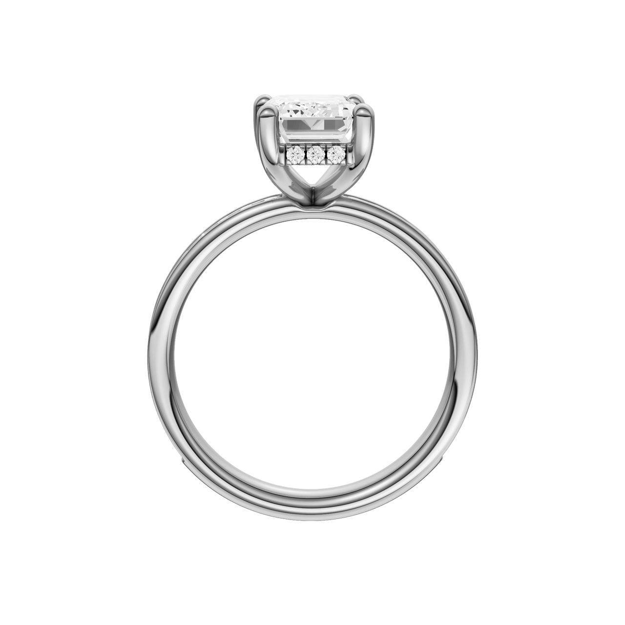 A profile view of the Emerald cut diamond engagement ring in 14k white gold with a diamond channel band and cathedral setting