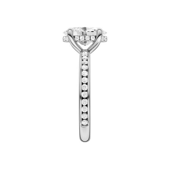 A side view of the Oval cut diamond engagement ring in 14k white gold with a diamond channel band and cathedral setting