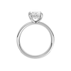 A profile view of the Oval cut diamond engagement ring in 14k white gold with a diamond channel band and cathedral setting