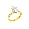A three-quarter view of the Pear cut diamond engagement ring in 14k yellow gold with a diamond channel band and cathedral setting