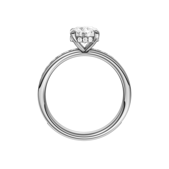 A profile view of the Round cut diamond engagement ring in 14k white gold with a diamond channel band and cathedral setting