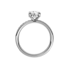 A profile view of the Round cut diamond engagement ring in 14k white gold with a diamond channel band and cathedral setting
