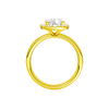 14K yellow gold oval halo engagement ring full band profile featuring oval halo center and channel set diamond band.