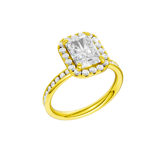 A three-quarter view of the Radiant cut diamond engagement ring in 14k yellow gold with a diamond channel band and cathedral setting