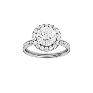 A front view of the Round cut diamond engagement ring in 14k white gold with a diamond channel band and halo setting