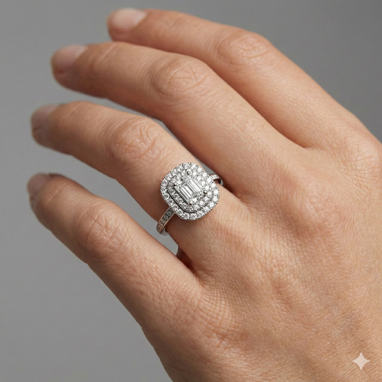 Emerald cut diamond engagement ring in 14k white gold  with a channel band and double halo setting on a hand