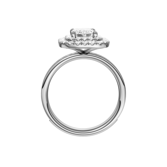 A profile view of the Emerald cut diamond engagement ring in 14k white gold  with a channel band and double halo setting