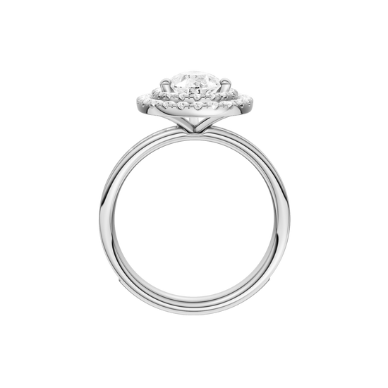 A profile view of the Pear cut diamond engagement ring in 14k white gold with a diamond channel band and cathedral setting