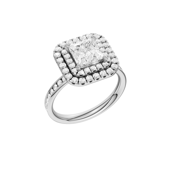 A three-quarter view of the Princess cut diamond engagement ring in platinum with a diamond channel band and cathedral setting