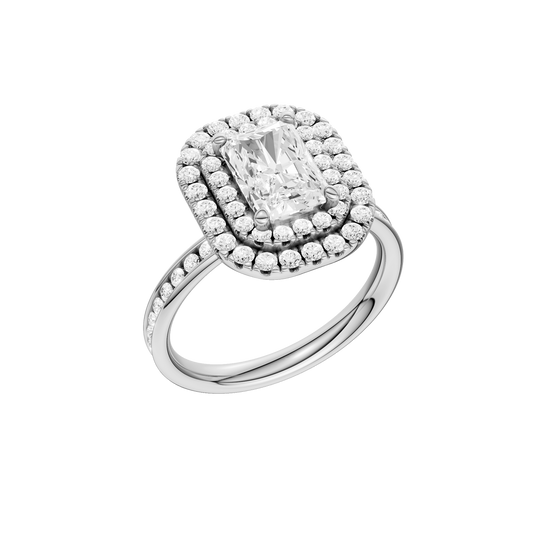 A three-quarter view of the Radiant cut diamond engagement ring in platinum with a diamond channel band and cathedral setting