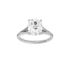 A front view of the Elongated cushion cut diamond engagement ring in platinum with a plain band and split setting