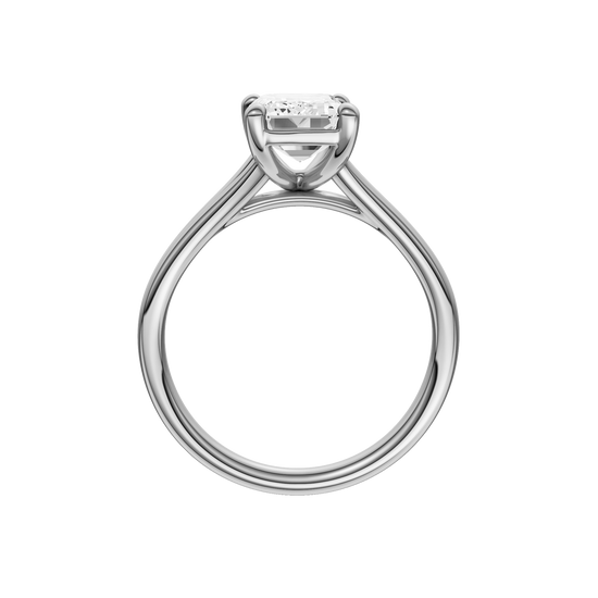 A profile view of the Emerald cut diamond engagement ring in 14k white gold with a plain band and split setting