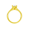 A profile view of the Marquise cut diamond engagement ring in 14k yellow gold with a plain band and solitaire setting