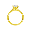 A profile view of the Oval cut diamond engagement ring in 14k yellow gold with a plain band and split setting