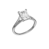 A three-quarter view of the Radiant cut diamond engagement ring in platinum with a plain band and split setting