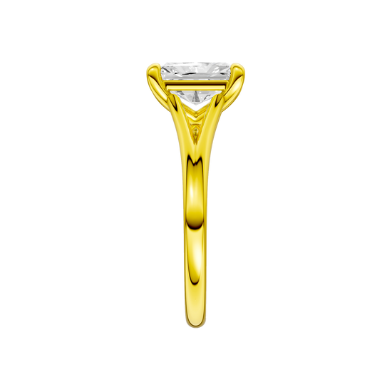 A side view of the Radiant cut diamond engagement ring in 14k yellow gold with a plain band and split setting