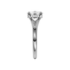 A side view of the Elongated Cushion cut diamond engagement ring in 14k white gold with a plain band and hidden halo setting