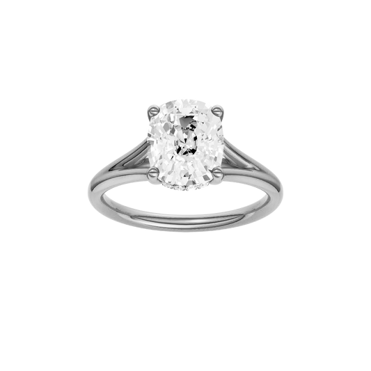 A front view of the Elongated Cushion cut diamond engagement ring in 14k white gold with a plain band and hidden halo setting