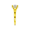 A side view of the Elongated Cushion cut diamond engagement ring in 14k yellow gold with a plain band and hidden halo setting