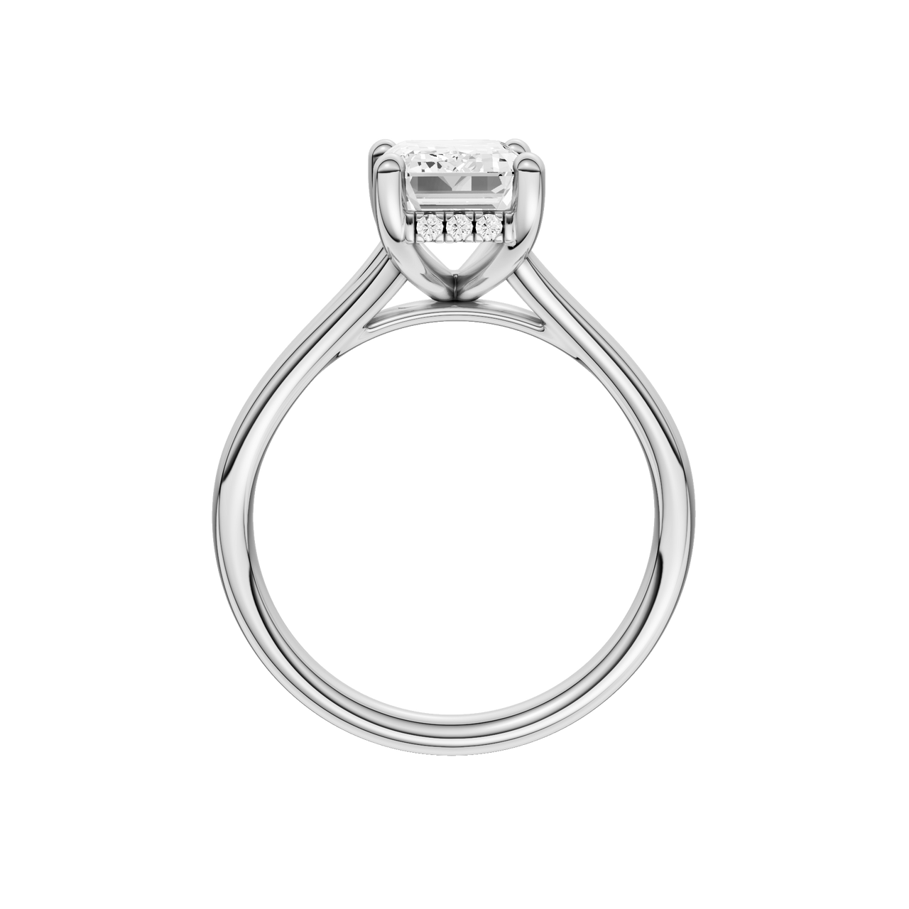 A profile view of the Emerald cut diamond engagement ring in 14k white gold with a plain band and hidden halo setting