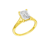 A three-quarter view of the Emerald cut diamond engagement ring in 14k yellow gold with a plain band and hidden halo setting