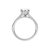 A profile view of the Marquise cut diamond engagement ring in 14k white gold with a plain band and hidden halo setting