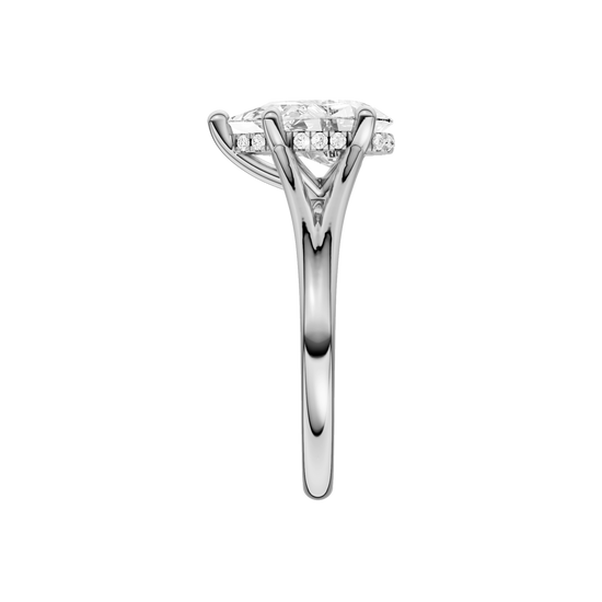 A side view of the Pear cut diamond engagement ring in platinum with a plain band and cathedral setting