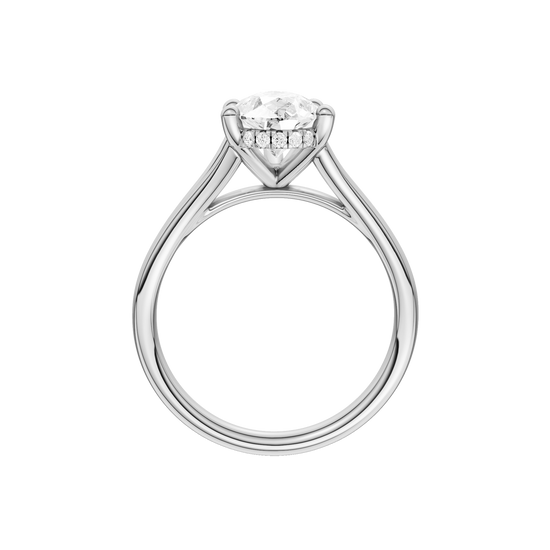 A profile view of the Pear cut diamond engagement ring in platinum with a plain band and cathedral setting