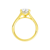 A profile view of the Pear cut diamond engagement ring in 14k yellow gold with a plain band and cathedral setting