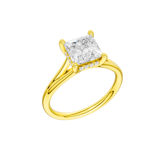A three-quarter view of the Princess cut diamond engagement ring in 14k yellow gold with a plain band and hidden halo setting