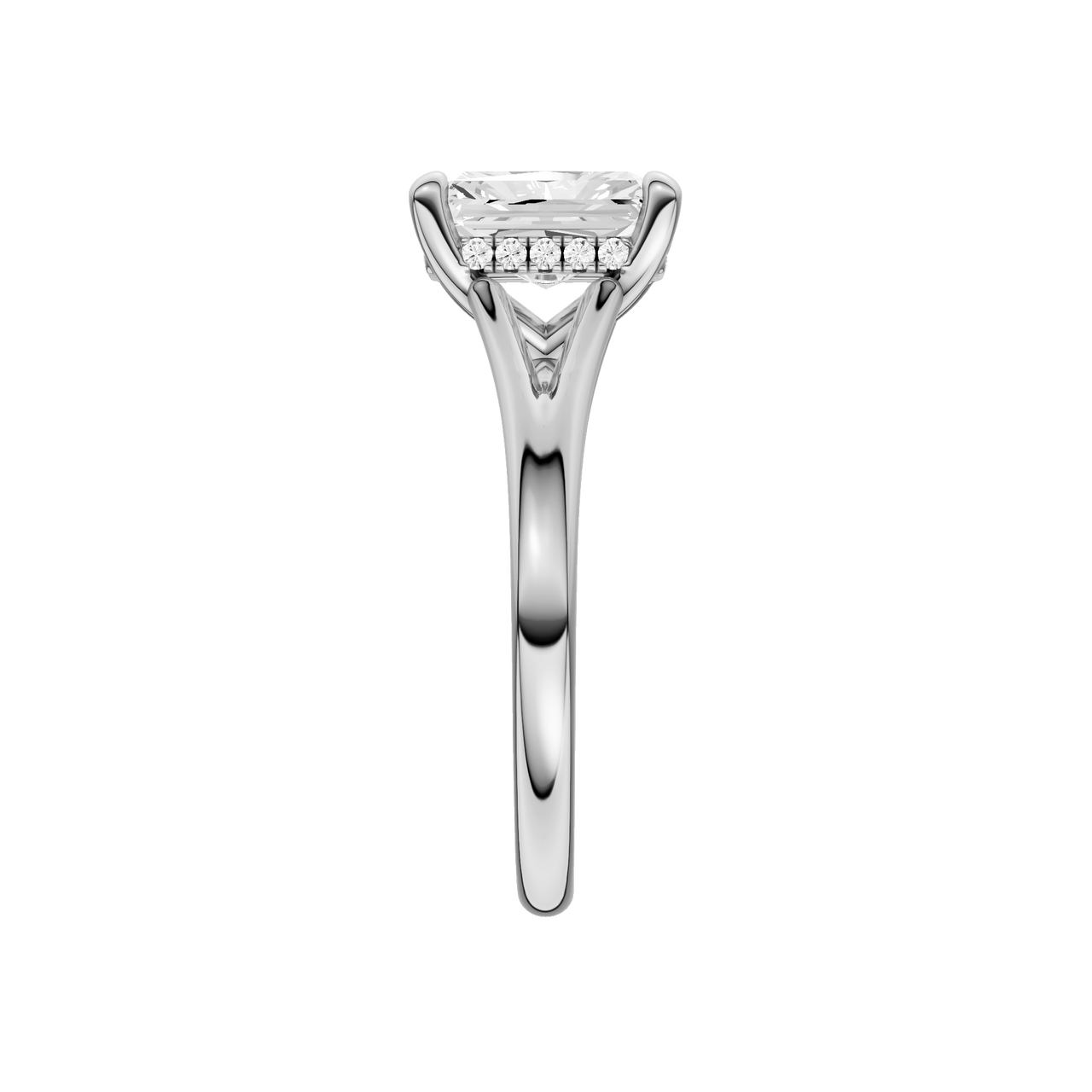A side view of the Radiant cut diamond engagement ring in 14k white gold with a plain band and hidden halo setting
