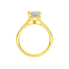 A profile view of the Radiant cut diamond engagement ring in 14k yellow gold with a plain band and hidden halo setting