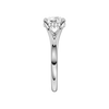 A side view of the Round cut diamond engagement ring in 14k white gold with a plain band and hidden halo setting