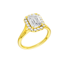 A three-quarter view of the Emerald cut diamond engagement ring in 14k yellow gold with a plain band and halo setting