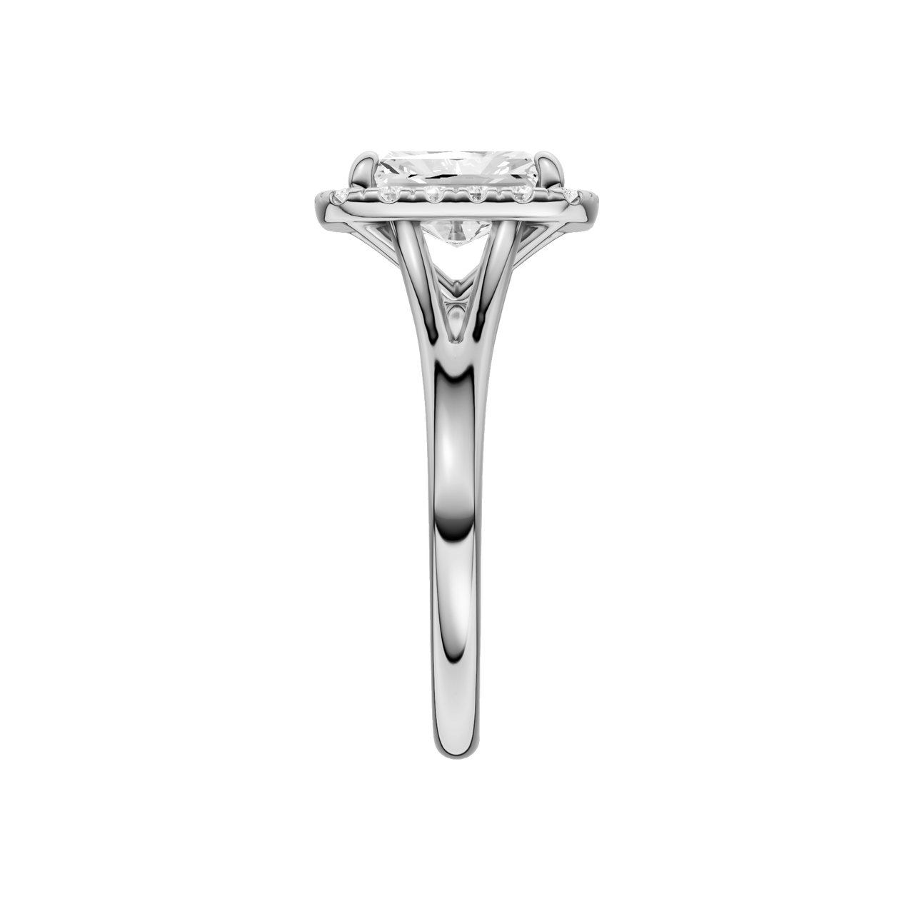 A side view of the Radiant cut diamond engagement ring in 14k white gold with a plain band and halo setting