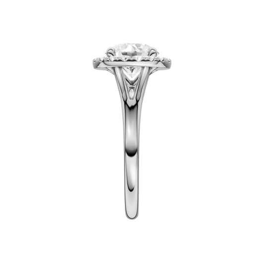 A side view of the Round cut diamond engagement ring in 14k white gold with a plain band and halo setting