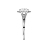 A side view of the Round cut diamond engagement ring in platinum with a plain band and halo setting