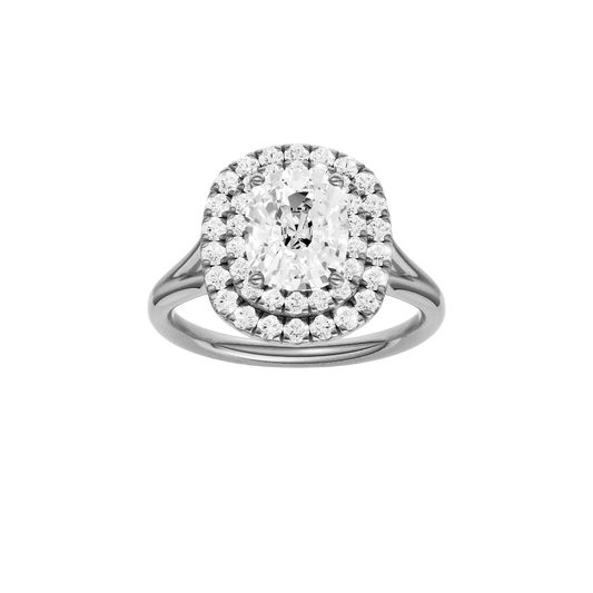A front view of the Elongated Cushion cut diamond engagement ring in 14k white gold with a plain band and double halo setting