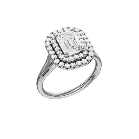 A three-quarter view of the Emerald cut diamond engagement ring in platinum  with a plain band and double halo setting