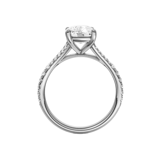 A profile view of the Elongated Cushion cut diamond engagement ring in 14k white gold with a prong band and solitaire setting
